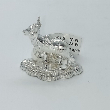 Silver idol in cow design