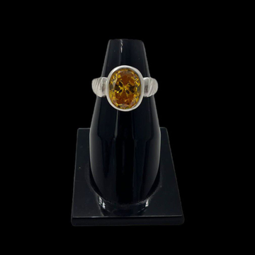 Silver ring in yellow sapphire (पोखराज नंग)