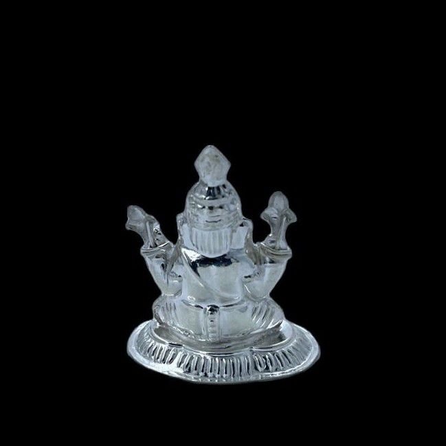 Silver design in small ganeshji idol